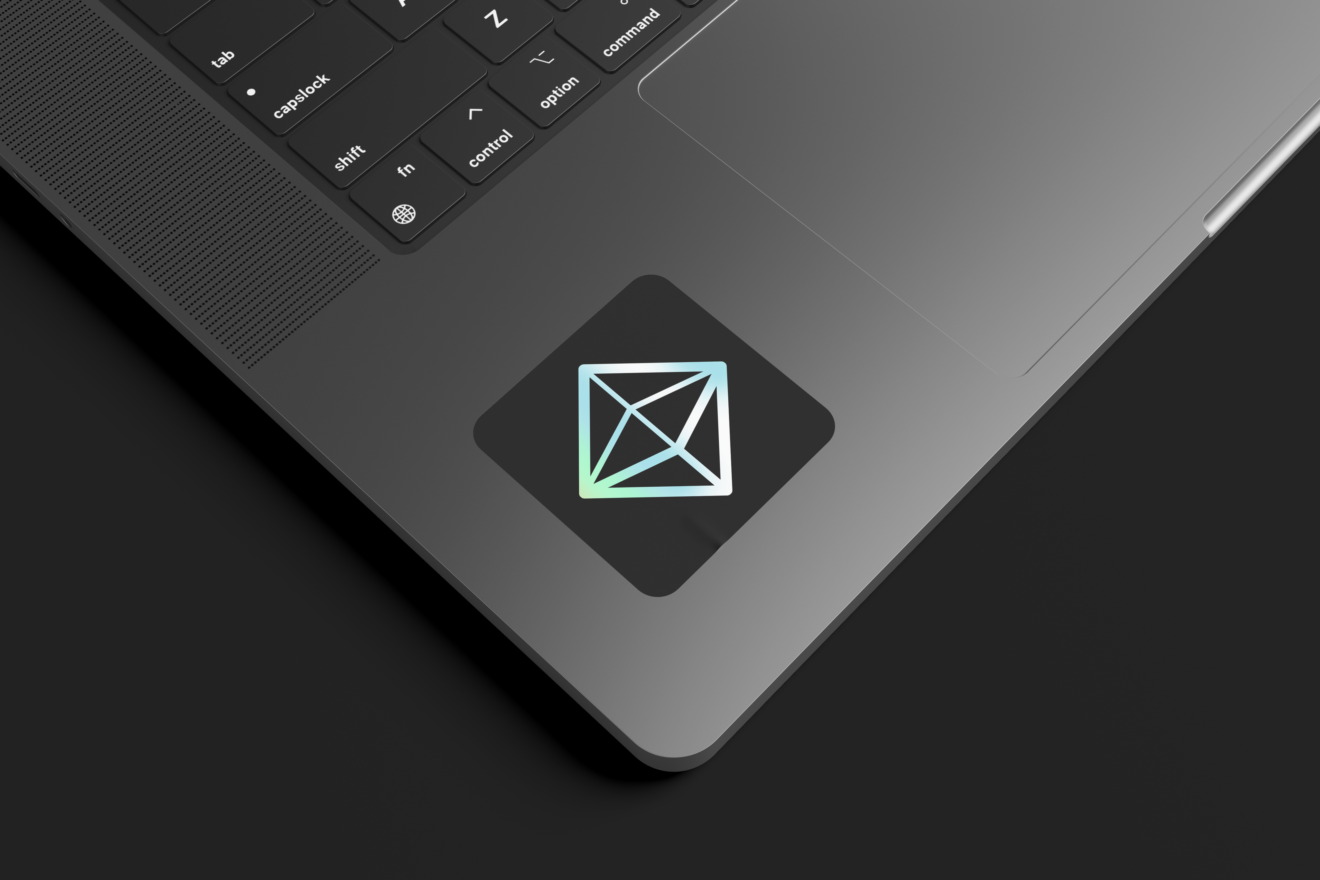 Hologram octahedron sticker on laptop