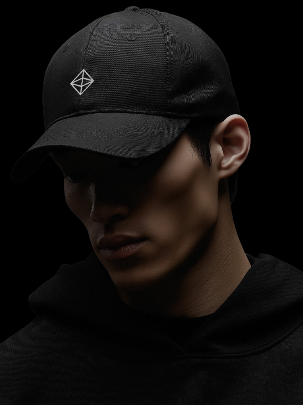 Black cap with embroidered octahedron mark